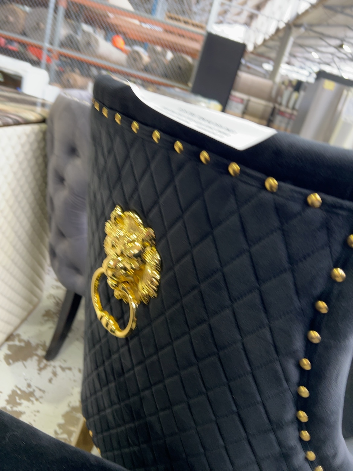 EX SHOWROOM - PROVENCE BLACK VELVET DINING CHAIR WITH GOLD LEGS AND GOLD LIONS HEAD ON BACK, SOLD AS IS EX SHOWROOM - PROVENCE BLACK VELVET DINING CHAIR WITH GOLD LEGS AND GOLD LIONS HEAD ON BACK, SOLD AS IS