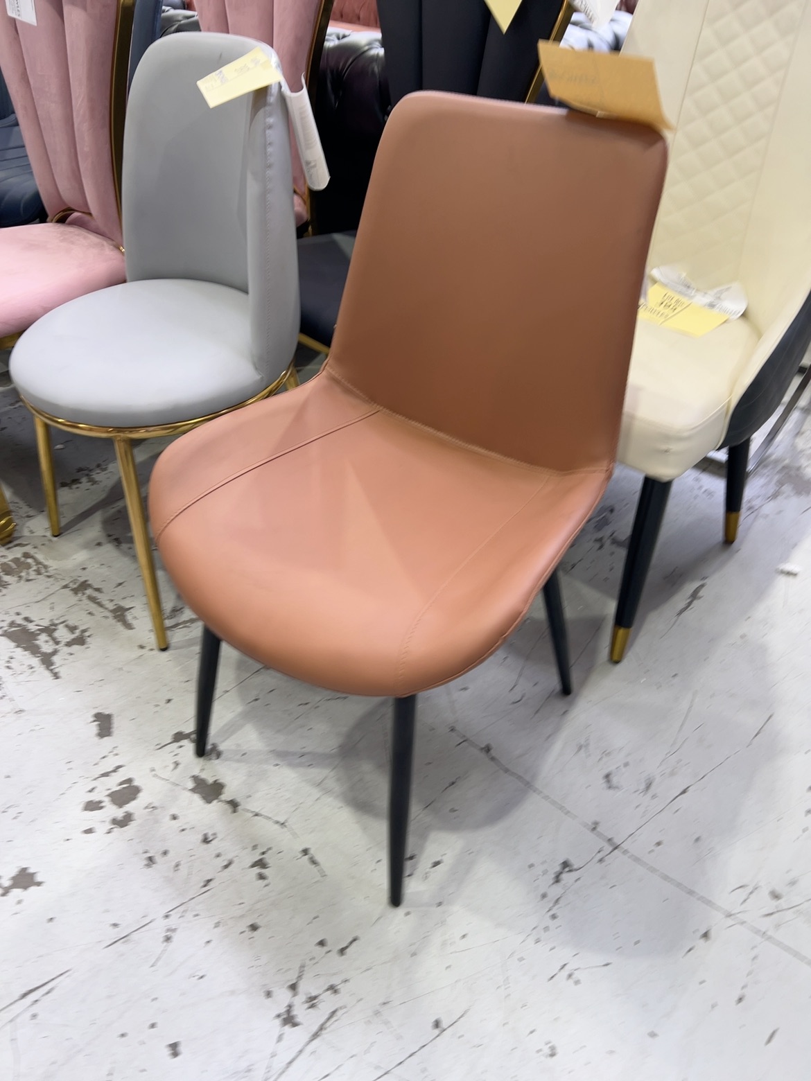 EX SHOWROOM - TAN LEATHER DINING CHAIR, SOLD AS IS EX SHOWROOM - TAN LEATHER DINING CHAIR, SOLD AS IS