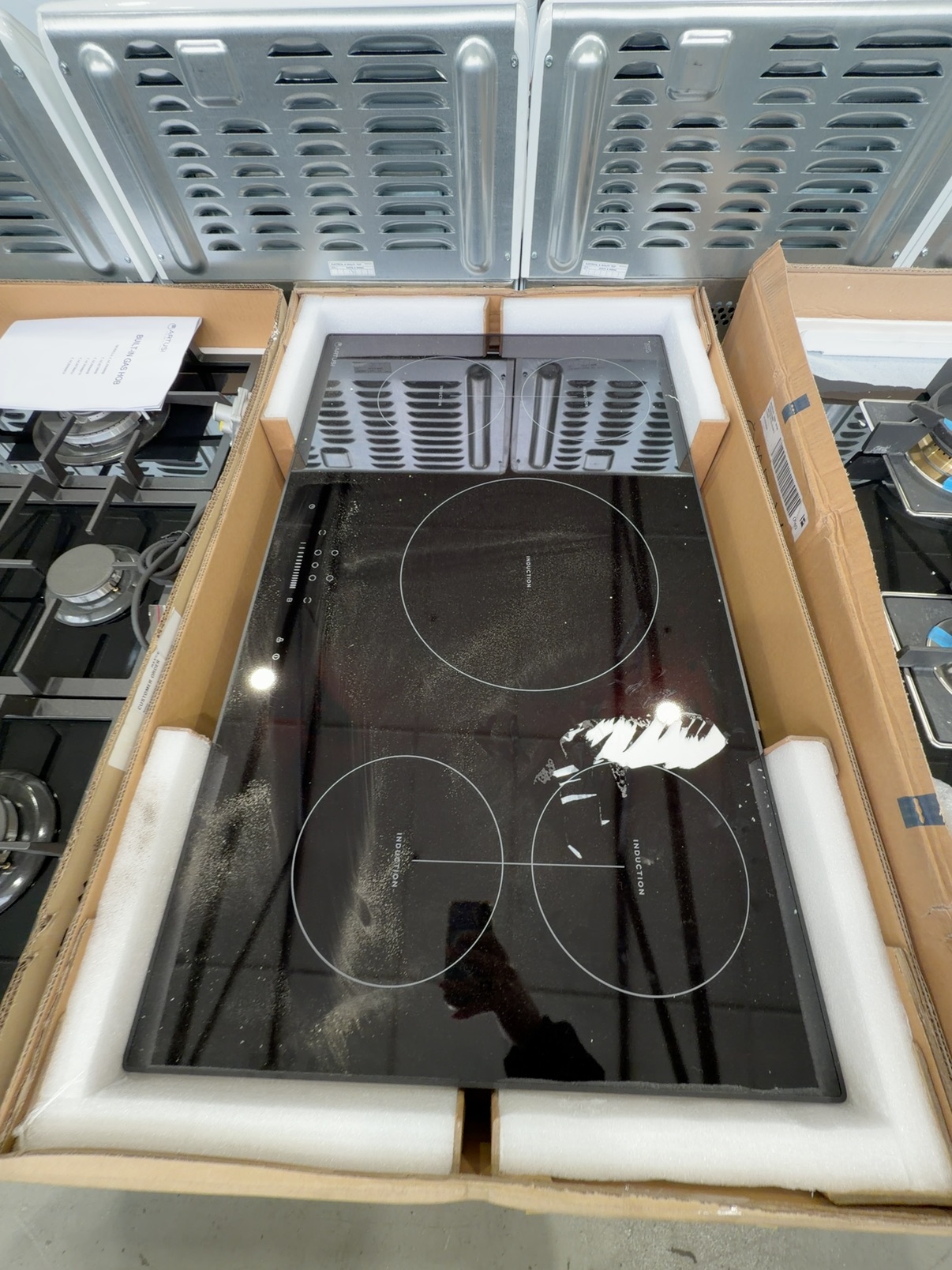 NEW ARTUSI 900MM INDUCTION COOKTOP CAID95B, 9 HEAT LEVELS, RRP$1500 14 DAY WARRANTY NEW ARTUSI 900MM INDUCTION COOKTOP CAID95B, 9 HEAT LEVELS, RRP$1500 14 DAY WARRANTY