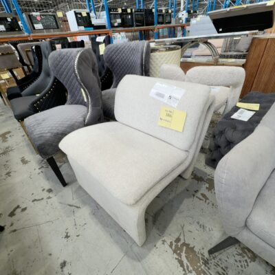 EX STAGING - BEIGE CURVED BOUCLE CHAIR SOLD AS IS