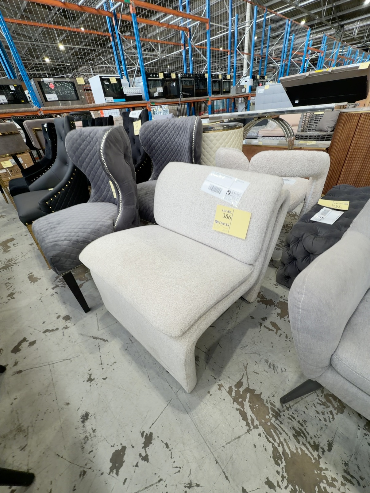 EX STAGING - BEIGE CURVED BOUCLE CHAIR SOLD AS IS EX STAGING - BEIGE CURVED BOUCLE CHAIR SOLD AS IS