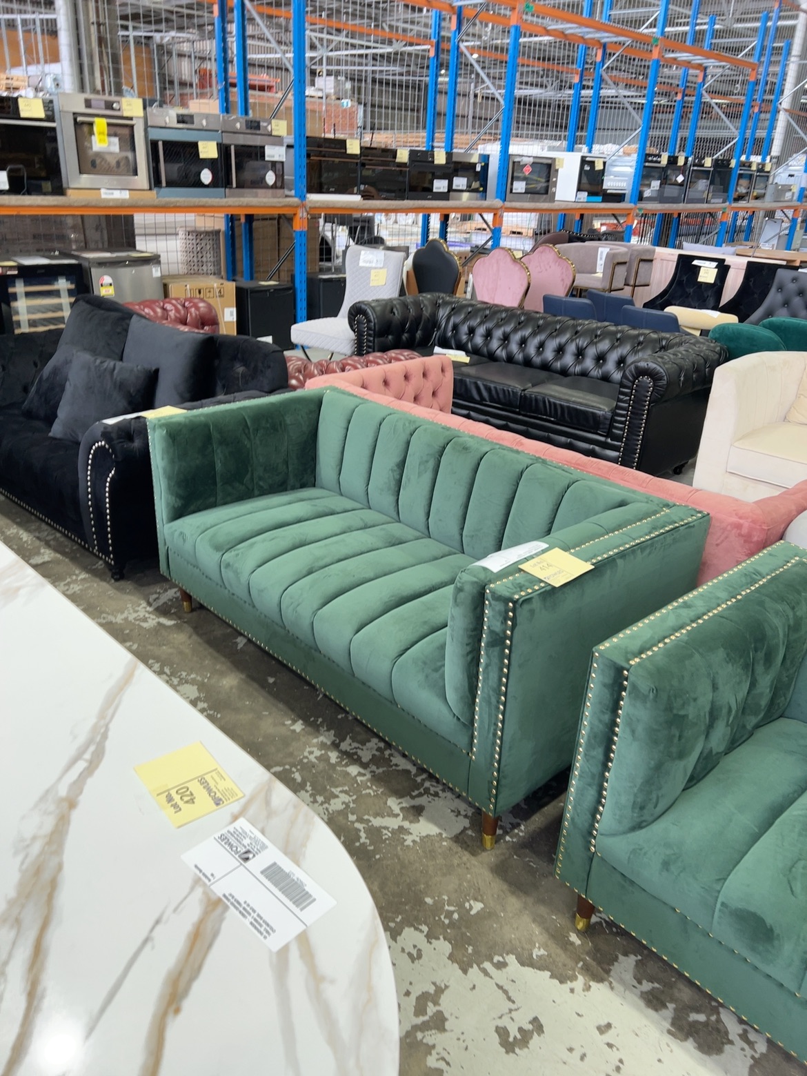 EX SHOWROOM - MALBEC 2 SEATER EMERALD GREEN SOFA WITH STUD DETAIL, 1750MM LONG, SOLD AS IS EX SHOWROOM - MALBEC 2 SEATER EMERALD GREEN SOFA WITH STUD DETAIL, 1750MM LONG, SOLD AS IS