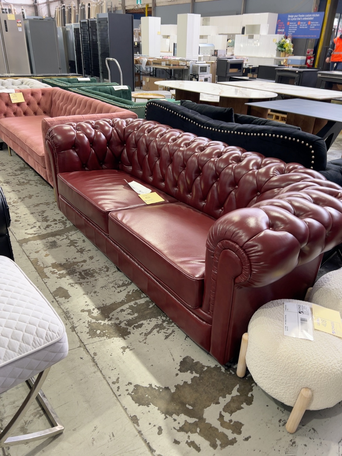 EX SHOWROOM - NESTER 2 SEATER CHESTERFIELD, BURGUNDY BONDED LEATHER 1660MM LONG, SOLD AS IS EX SHOWROOM - NESTER 2 SEATER CHESTERFIELD, BURGUNDY BONDED LEATHER 1660MM LONG, SOLD AS IS