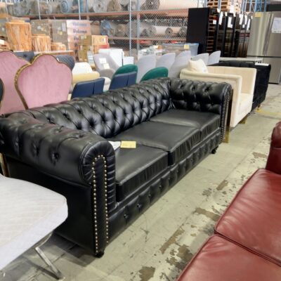 EX SHOWROOM - NESTER 3 SEATER CHESTERFIELD SOFA, BLACK BONDED LEATHER, 2250MM LONG, SOLD AS IS EX SHOWROOM - NESTER 3 SEATER CHESTERFIELD SOFA, BLACK BONDED LEATHER, 2250MM LONG, SOLD AS IS