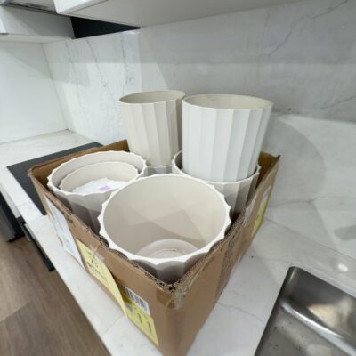 EX STAGING BOX OF PLANT POTS, SOLD AS IS