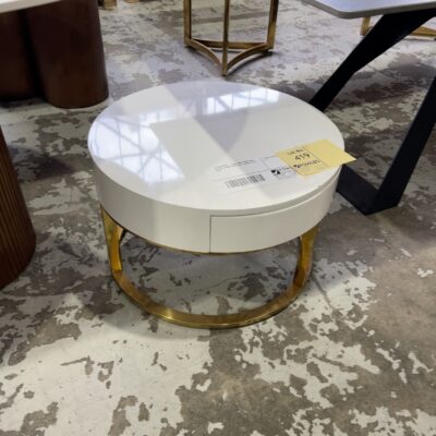EX SHOWROOM - ROUND WHITE SIDE TABLE ON GOLD FRAME, SOME SMALL DAMAGE, SOLD AS IS