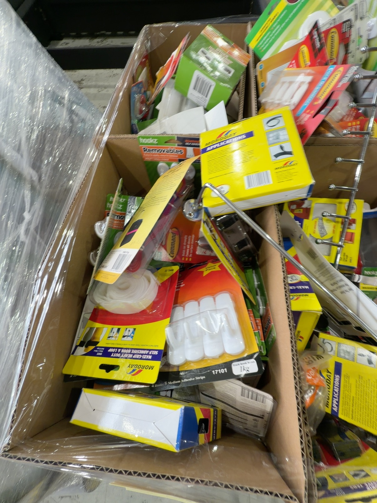 PALLET OF ASSORTED REMOVEABLE HOOKS & STORAGE ETC SOLD AS IS PALLET OF ASSORTED REMOVEABLE HOOKS & STORAGE ETC SOLD AS IS
