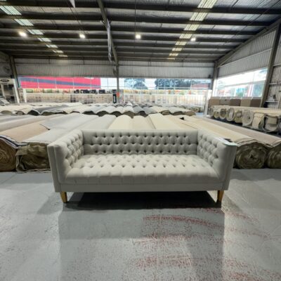 EX STAGING - LIGHT GREY BUTTON UPHOLSTERED 3 SEATER COUCH, SOLD AS IS EX STAGING - LIGHT GREY BUTTON UPHOLSTERED 3 SEATER COUCH, SOLD AS IS