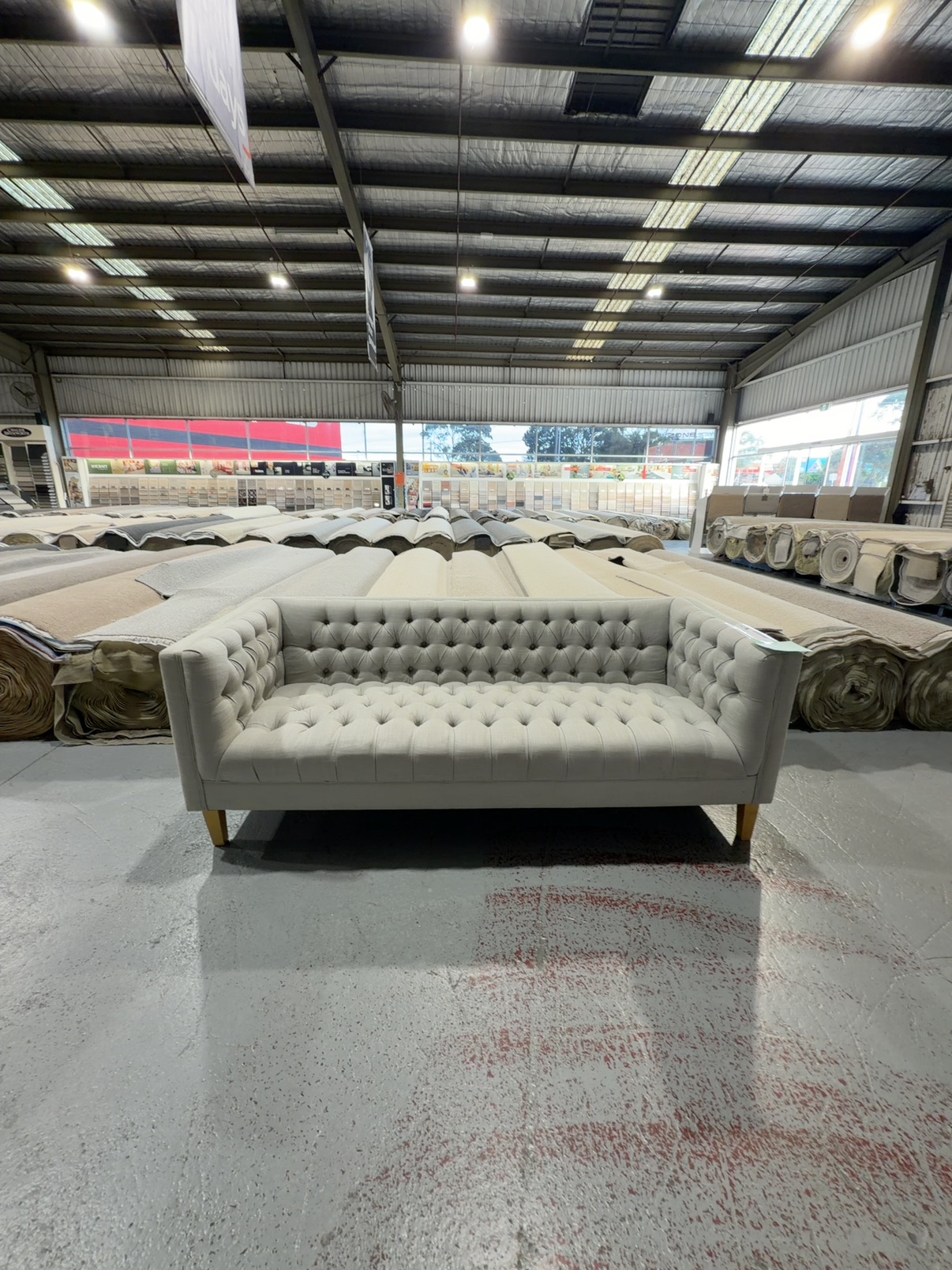EX STAGING - LIGHT GREY BUTTON UPHOLSTERED 3 SEATER COUCH, SOLD AS IS EX STAGING - LIGHT GREY BUTTON UPHOLSTERED 3 SEATER COUCH, SOLD AS IS