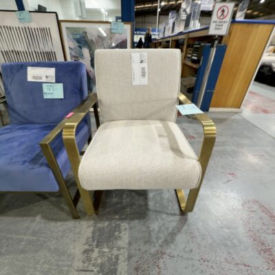 EX STAGING - BEIGE ARMCHAIR, BRUSHED GOLD FRAME, SOLD AS IS