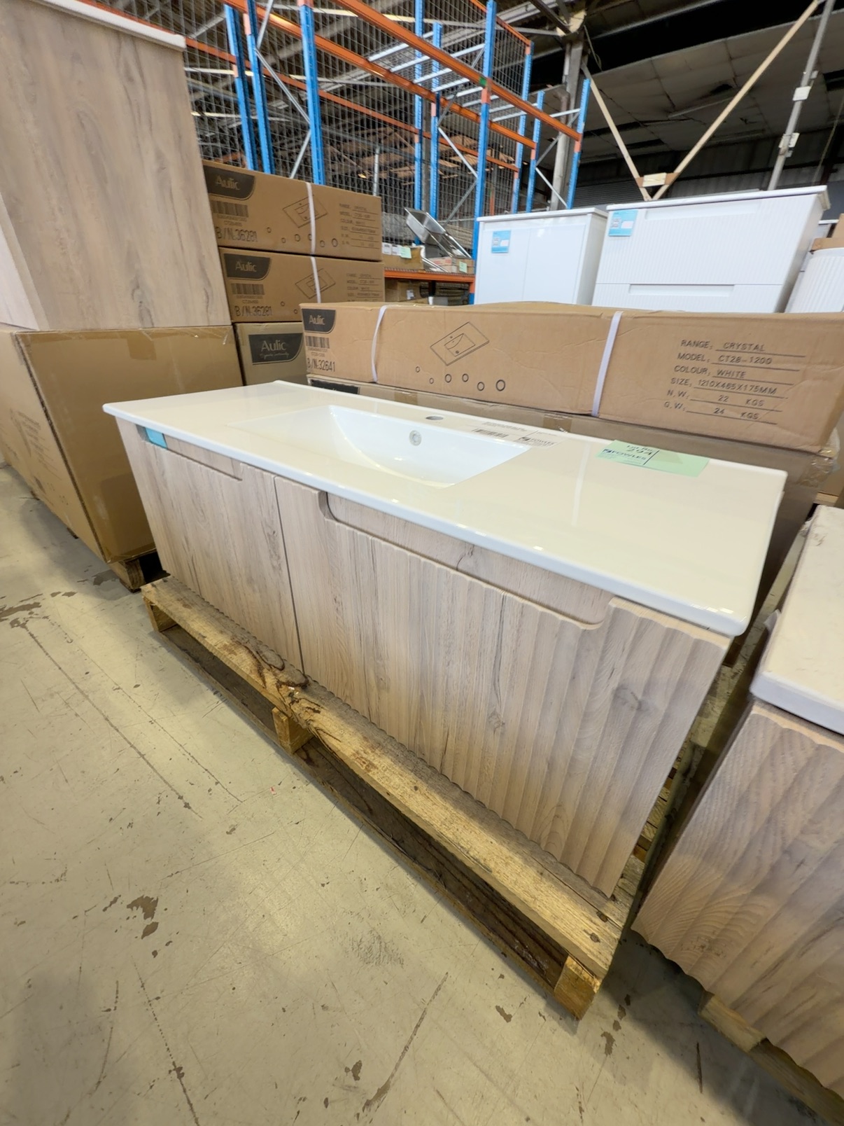 NEW AULIC CALDER 1200MM WALL HUNG VANITY, NATURAL OAK WAVE GROOVE FINISH, WITH CRYSTAL CERAMIC TOP CAWH44-1200-ST28 RRP$2045 NEW AULIC CALDER 1200MM WALL HUNG VANITY, NATURAL OAK WAVE GROOVE FINISH, WITH CRYSTAL CERAMIC TOP CAWH44-1200-ST28 RRP$2045
