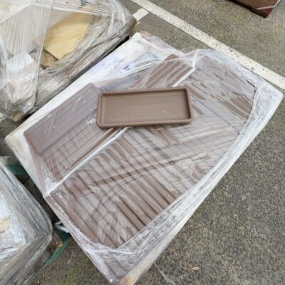 PALLET OF BROWN RECTANGLE PLANT POT SAUCERS, SOLD AS IS PALLET OF BROWN RECTANGLE PLANT POT SAUCERS, SOLD AS IS