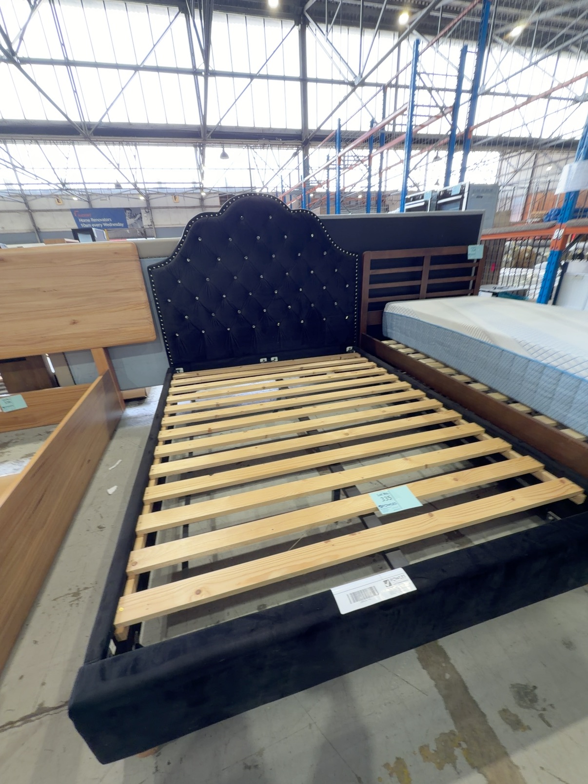 EX SHOWROOM - LUXOR BLACK VELVET BEDFRAME, SCALLOPED BEDHEAD WITH CRYSTAL BUTTON UPHOLSTERY EX SHOWROOM - LUXOR BLACK VELVET BEDFRAME, SCALLOPED BEDHEAD WITH CRYSTAL BUTTON UPHOLSTERY