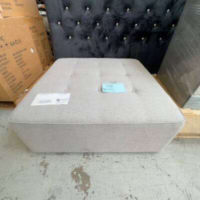 EX SHOWROOM, LARGE GREY FABRIC OTTOMAN, SOLD AS IS EX SHOWROOM, LARGE GREY FABRIC OTTOMAN, SOLD AS IS