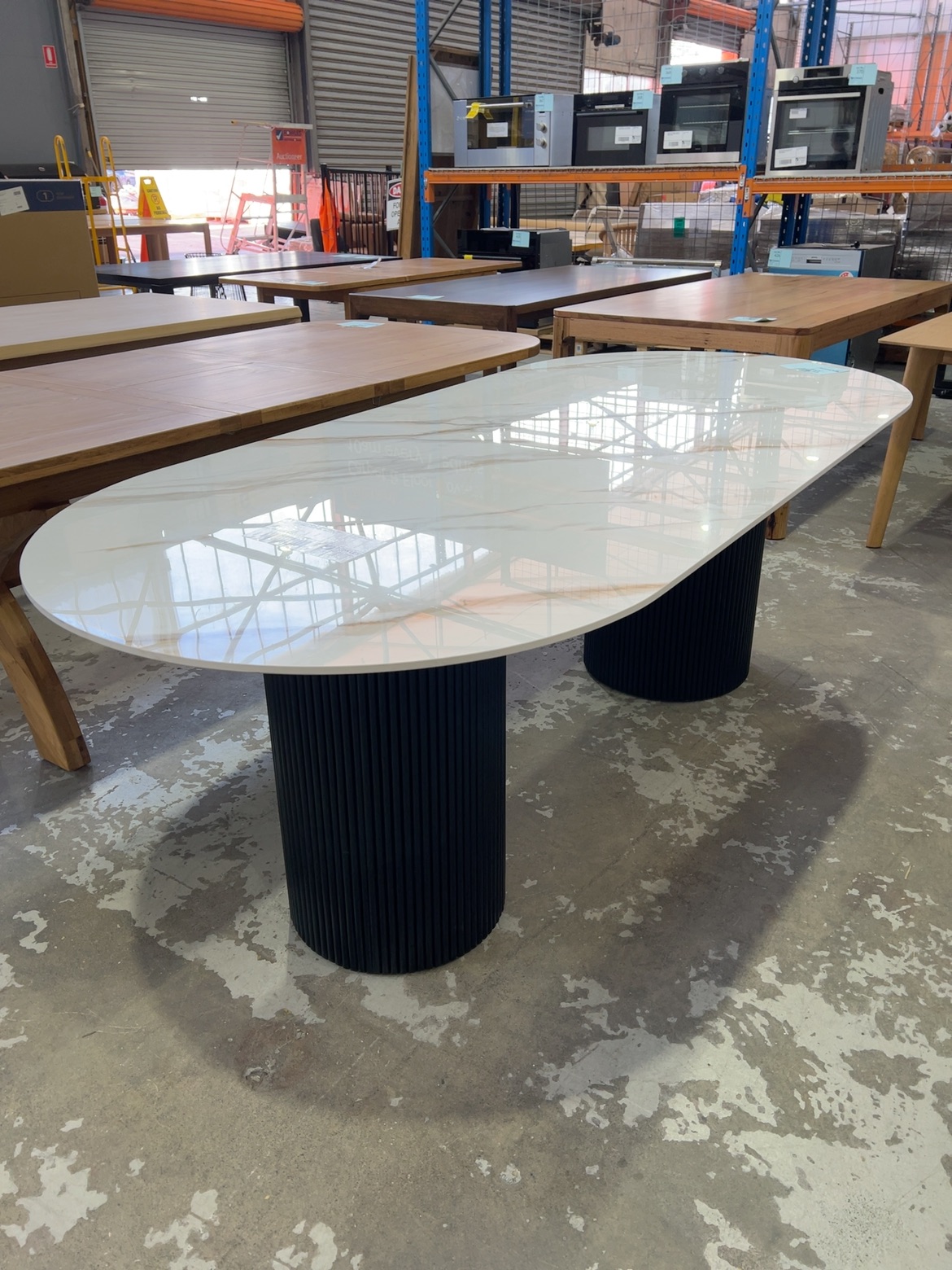 NEW LISBON MARBLE 2200MM DINING TABLE, WITH TIMBER FLUTED BASE, SOLD AS IS NEW LISBON MARBLE 2200MM DINING TABLE, WITH TIMBER FLUTED BASE, SOLD AS IS