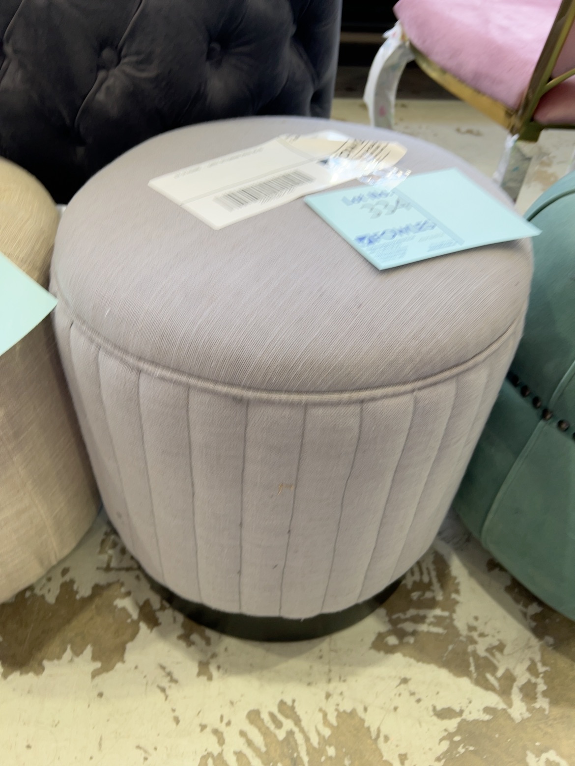 EX STAGING - GREY OTTOMAN SOLD AS IS EX STAGING - GREY OTTOMAN SOLD AS IS