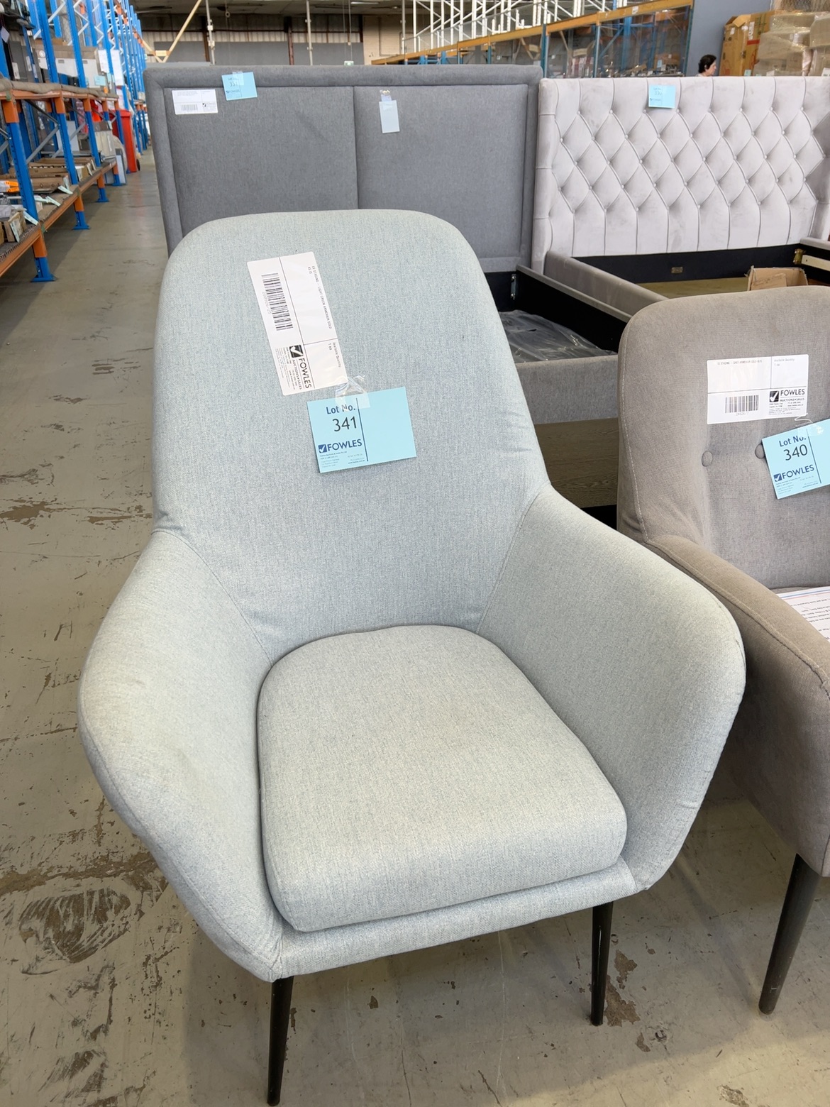 EX STAGING - LIGHT GREEN ARMCHAIR SOLD AS IS EX STAGING - LIGHT GREEN ARMCHAIR SOLD AS IS
