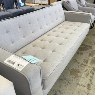 EX STAGING - GREY BUTTON UPHOLSTERED 3 SEATER COUCH SOLD AS IS EX STAGING - GREY BUTTON UPHOLSTERED 3 SEATER COUCH SOLD AS IS