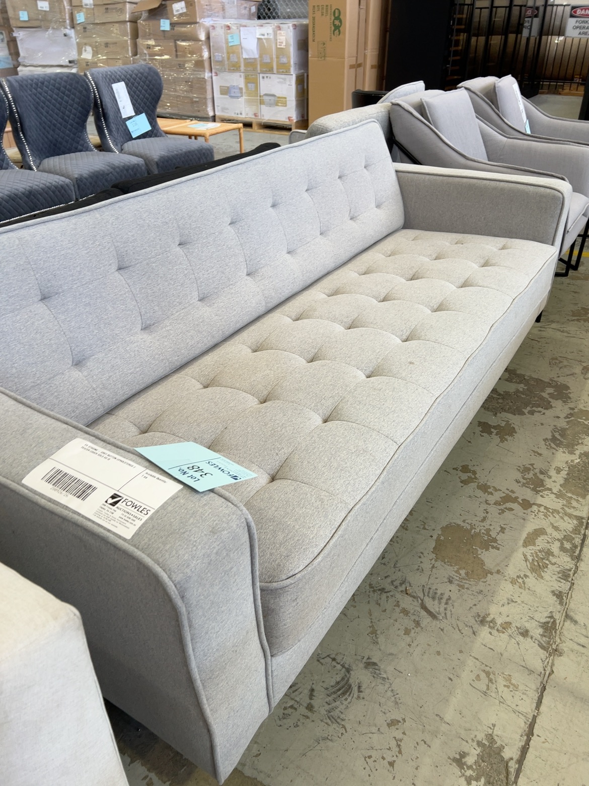 EX STAGING - GREY BUTTON UPHOLSTERED 3 SEATER COUCH SOLD AS IS EX STAGING - GREY BUTTON UPHOLSTERED 3 SEATER COUCH SOLD AS IS