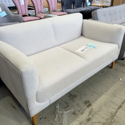 EX STAGING - GREY 2 SEATER COUCH SOLD AS IS EX STAGING - GREY 2 SEATER COUCH SOLD AS IS