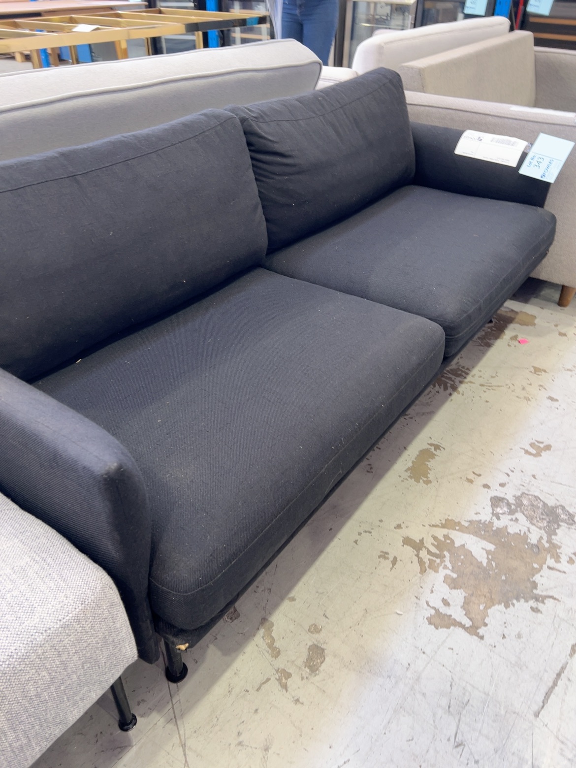 EX STAGING - BLACK FABRIC 2 SEATER COUCH, SOLD AS IS EX STAGING - BLACK FABRIC 2 SEATER COUCH, SOLD AS IS