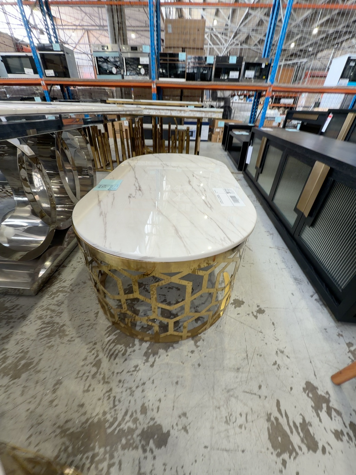 EX SHOWROOM - OLIVIA 1300MM MARBLE COFFEE TABLE WITH GOLD HONEYCOMB BASE EX SHOWROOM - OLIVIA 1300MM MARBLE COFFEE TABLE WITH GOLD HONEYCOMB BASE