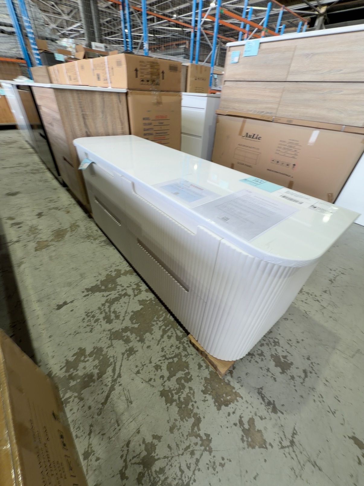 NEW AULIC CURVA 1500MM WALL HUNG VANITY, MATTE WHITE FLUTED FINISH, 4 DRAWERS WITH PUREFLAT SOLID SURFACE CURVED STONE TOP RRP$3589 CAWH46-1500-ST56FT NEW AULIC CURVA 1500MM WALL HUNG VANITY, MATTE WHITE FLUTED FINISH, 4 DRAWERS WITH PUREFLAT SOLID SURFACE CURVED STONE TOP RRP$3589 CAWH46-1500-ST56FT