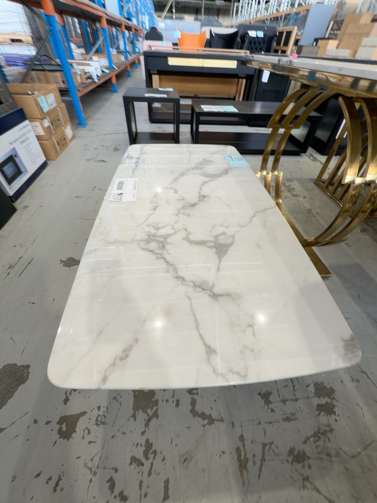 EX SHOWROOM - SIENNA 1300MM MARBLE COFFEE TABLE WITH BRUSHED GOLD BASE EX SHOWROOM - SIENNA 1300MM MARBLE COFFEE TABLE WITH BRUSHED GOLD BASE