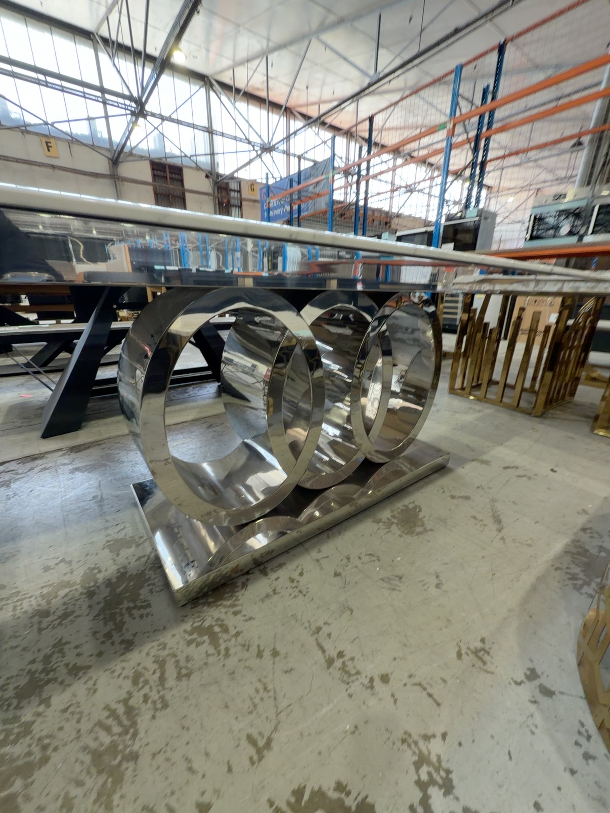 EX SHOWROOM - MONACO 2000MM MARBLE DINING TABLE, BEVELLED EDGE, WITH STATEMENT CHROME RING BASE EX SHOWROOM - MONACO 2000MM MARBLE DINING TABLE, BEVELLED EDGE, WITH STATEMENT CHROME RING BASE