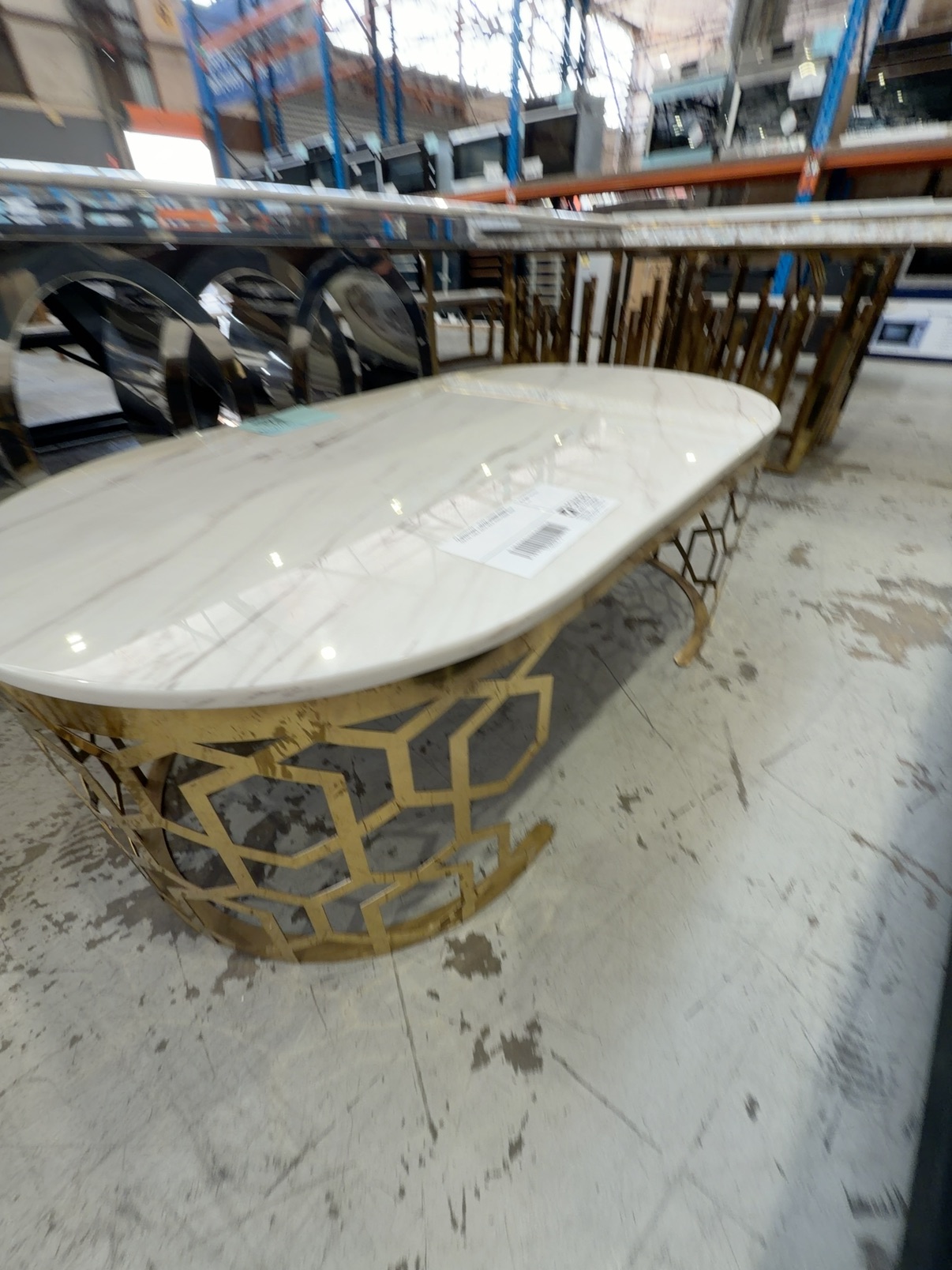 EX SHOWROOM - OLIVIA 1300MM MARBLE COFFEE TABLE WITH GOLD HONEYCOMB BASE EX SHOWROOM - OLIVIA 1300MM MARBLE COFFEE TABLE WITH GOLD HONEYCOMB BASE