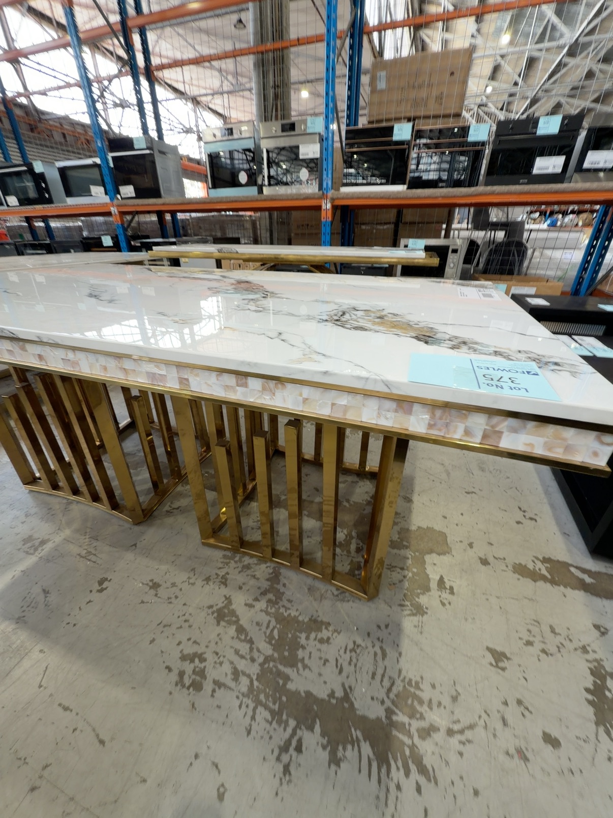 EX SHOWROOM - 1800MM MARBLE DINING TABLE WITH SHELL TRIM, AND GOLD STATEMENT BASE EX SHOWROOM - 1800MM MARBLE DINING TABLE WITH SHELL TRIM, AND GOLD STATEMENT BASE