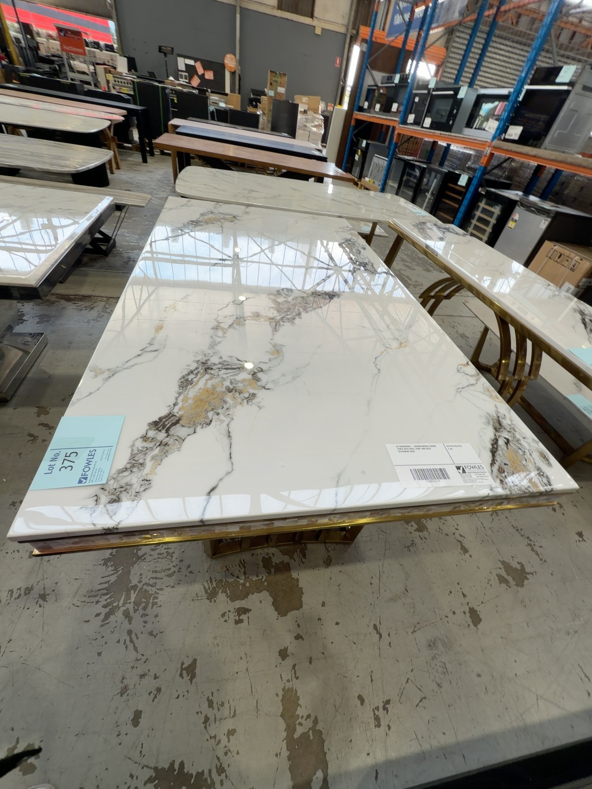 EX SHOWROOM - 1800MM MARBLE DINING TABLE WITH SHELL TRIM, AND GOLD STATEMENT BASE EX SHOWROOM - 1800MM MARBLE DINING TABLE WITH SHELL TRIM, AND GOLD STATEMENT BASE