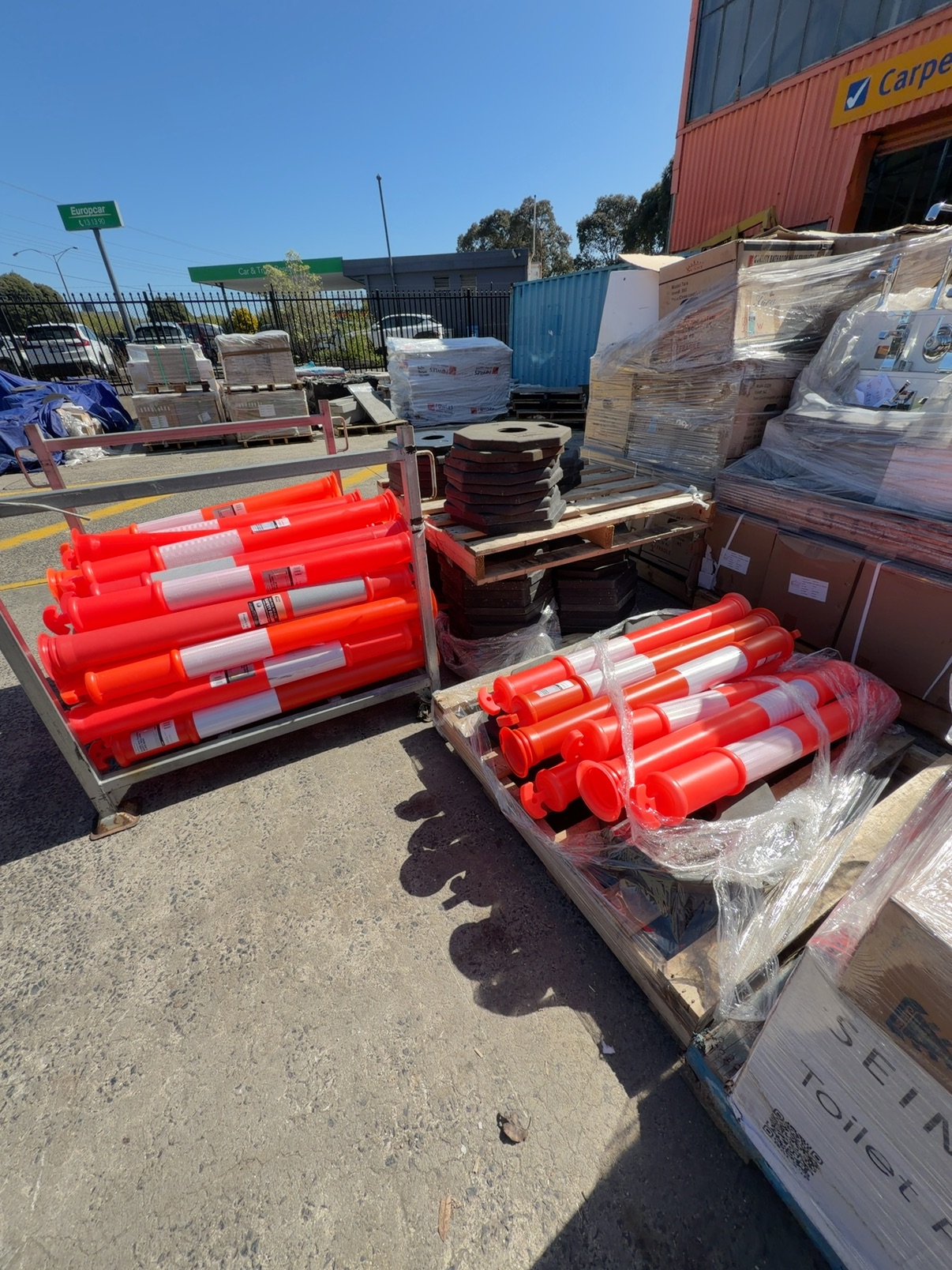 LARGE LOT OF HIGH VIS TRAFFIC BOLLARDS, SOLD AS IS LARGE LOT OF HIGH VIS TRAFFIC BOLLARDS, SOLD AS IS