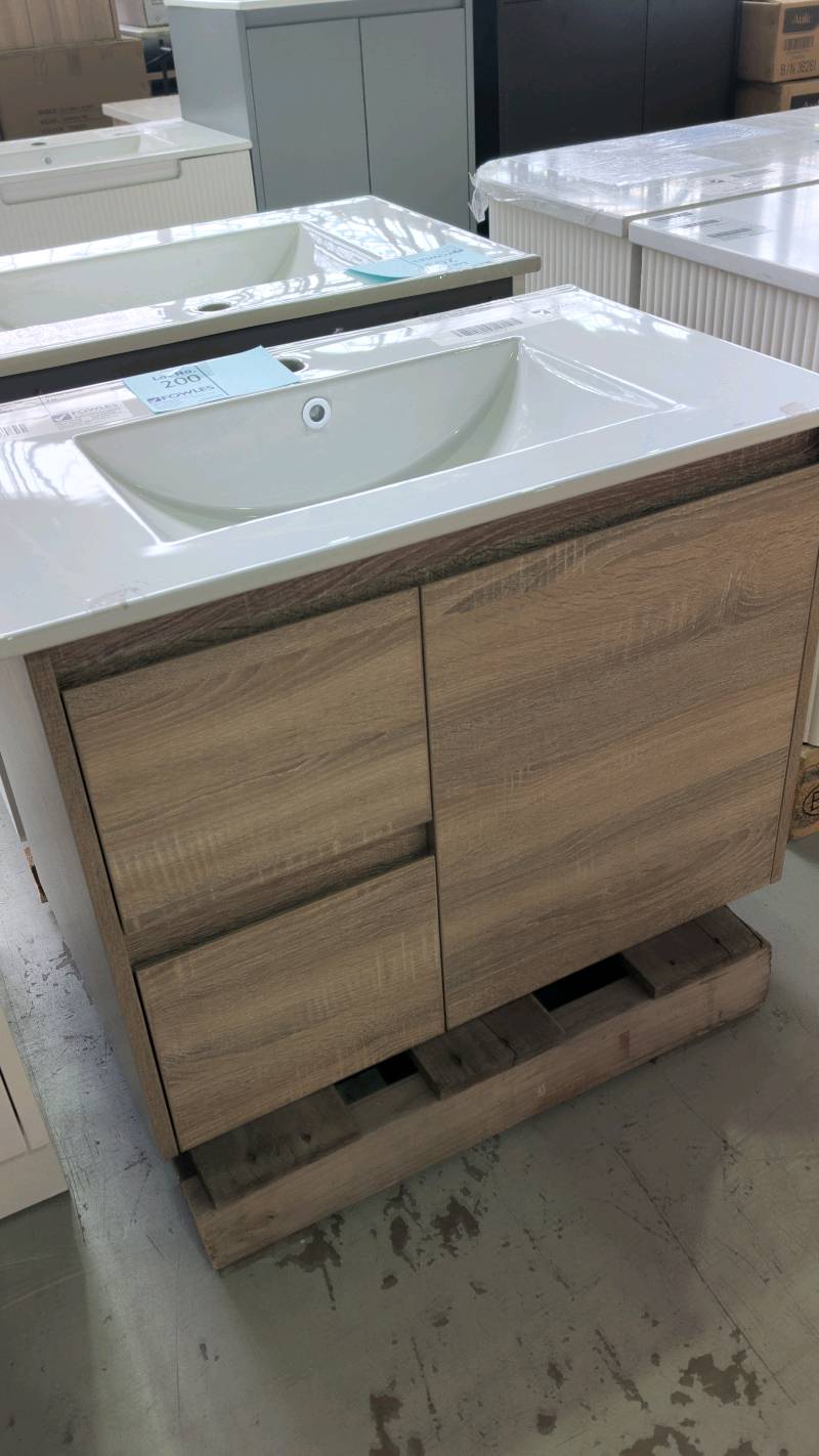 NEW GRACE 750MM WALL HUNG VANITY, OAK FINISH WITH LEFT HAND DRAWERS, WITH CRYSTAL WHITE CERAMIC TOP RRP$879 NEW GRACE 750MM WALL HUNG VANITY, OAK FINISH WITH LEFT HAND DRAWERS, WITH CRYSTAL WHITE CERAMIC TOP RRP$879