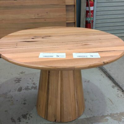 NEW OPAL WORMY CHESTNUT 1200MM ROUND DINING TABLE, WITH TAPERED PEDESTAL, SOLD AS IS NEW OPAL WORMY CHESTNUT 1200MM ROUND DINING TABLE, WITH TAPERED PEDESTAL, SOLD AS IS