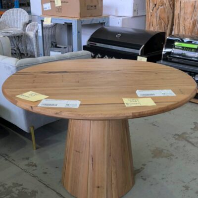 NEW OPAL WORMY CHESTNUT 1200MM ROUND DINING TABLE, WITH TAPERED PEDESTAL, SOLD AS IS