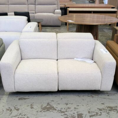 EX DISPLAY SOCHI 2 SEATER COUCH, IN HUSK FABRIC, ELECTRIC RECLINERS AND POWERED HEADRESTS, SOLD AS IS EX DISPLAY SOCHI 2 SEATER COUCH, IN HUSK FABRIC, ELECTRIC RECLINERS AND POWERED HEADRESTS, SOLD AS IS